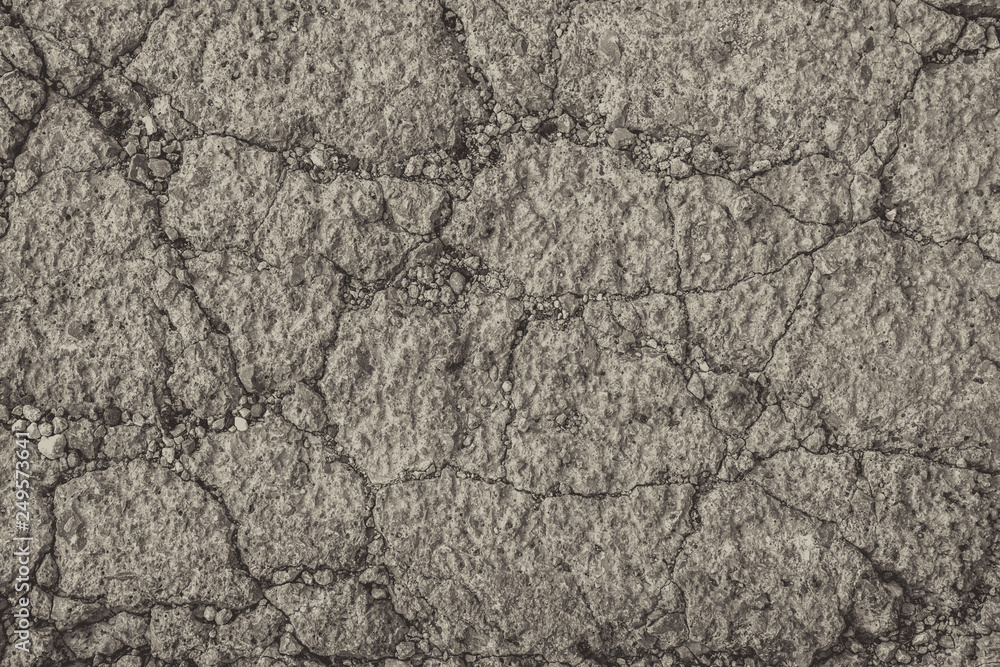 Gold textured concrete wall as an abstract background with cracks for poster, calendar, post, screensaver, wallpaper, postcard, card, banner, cover, website. A place for your design or text Gold textured concrete wall as an abstract background with cracks for poster, calendar, post, screensaver, wallpaper, postcard, card, banner, cover, website. A place for your design or text