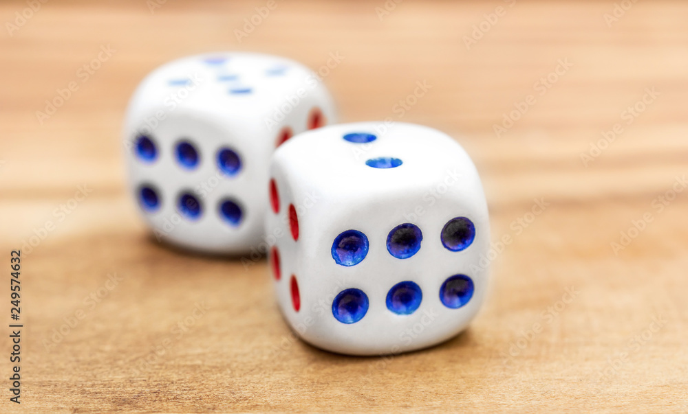 Dice on wooden background. Close up. Dice on wooden background. Close up.