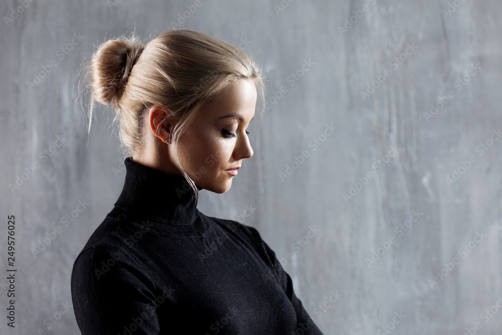 Portrait of beautiful blonde woman. Calm and self-confidence. Beautiful adult girl in black turtleneck Portrait of beautiful blonde woman. Calm and self-confidence. Beautiful adult girl in black turtleneck