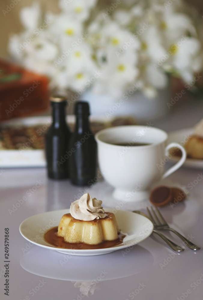 Cream jelly served with milk liqueur Cream jelly served with milk liqueur