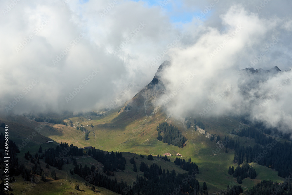 View of the mountain covered by the clouds. View of the mountain covered by the clouds.