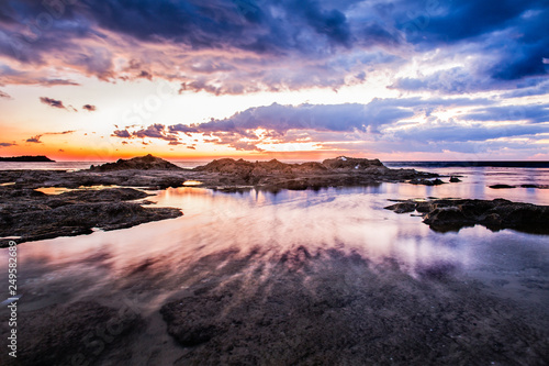 Sea landscape with sand, sky and clouds background.