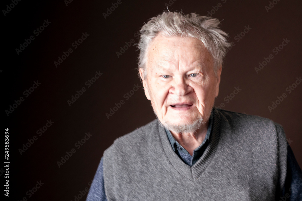 old senior man portrait on dark background b old senior man portrait on dark background b