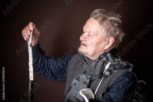 old senior sporty male with hockey equipment b