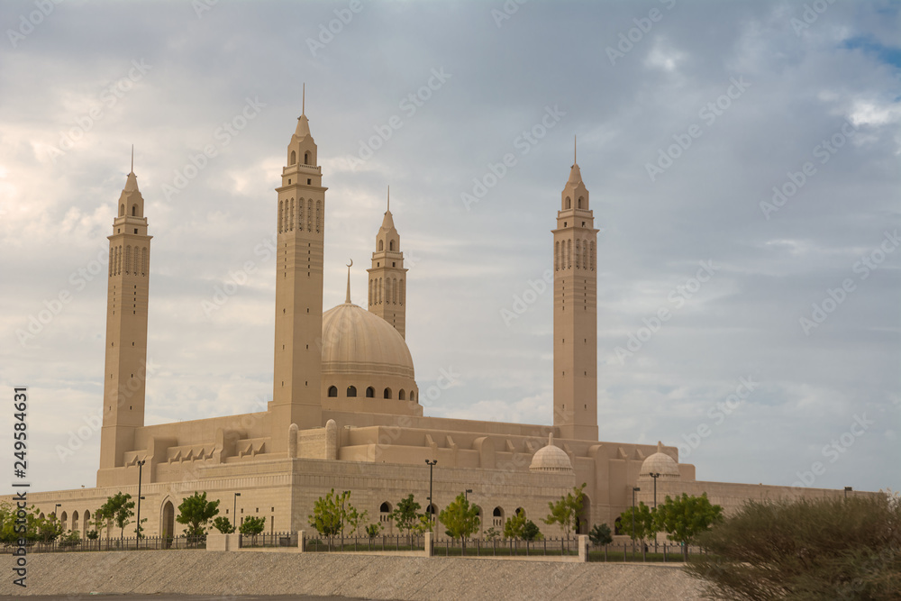 The four minarets and the dome of the new Mosque of Nizwa (Oman)