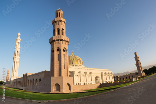 Dome and minaret of Sultan Qaboos Grand Mosque in Muscat (Oman)