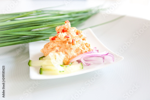 Liptauer cheese preparation on bright plate over white background. Clean eating, dieting, vegetarian, healthy food concept