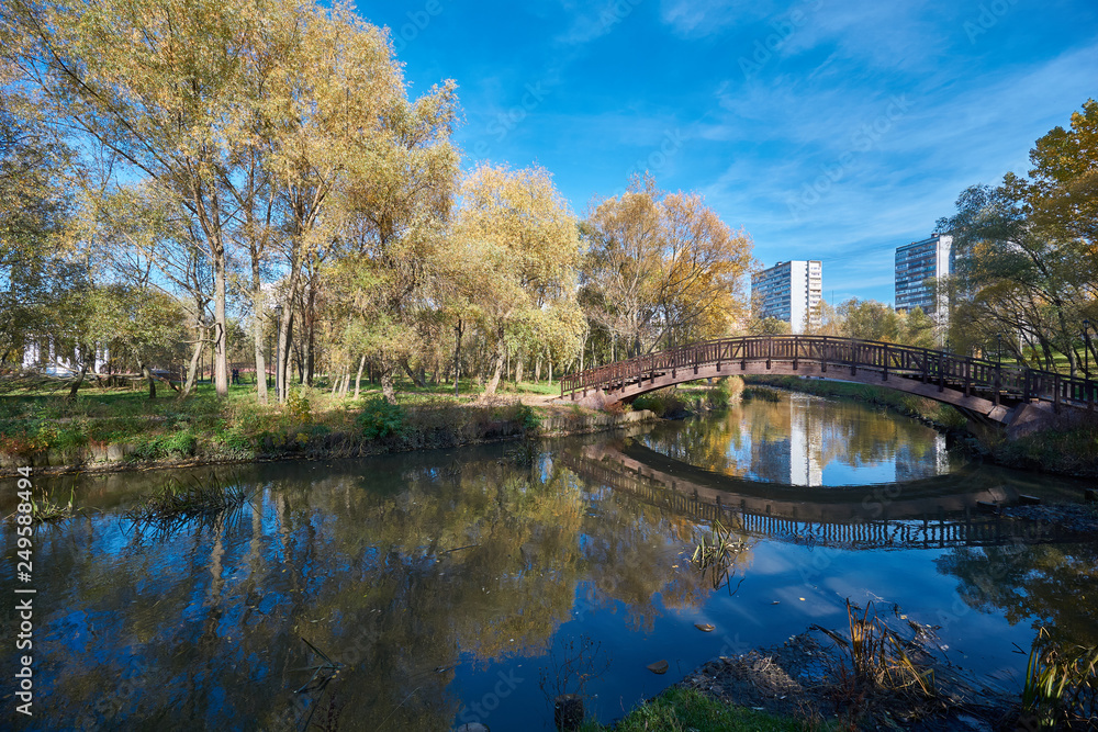 Wooden bridge across Yauza river