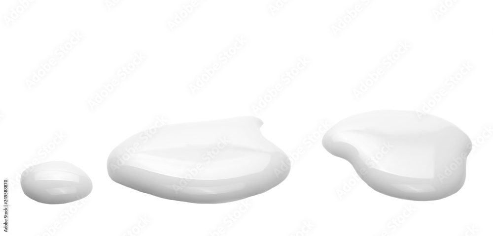 Spilled milk puddle isolated on white background and texture Spilled milk puddle isolated on white background and texture