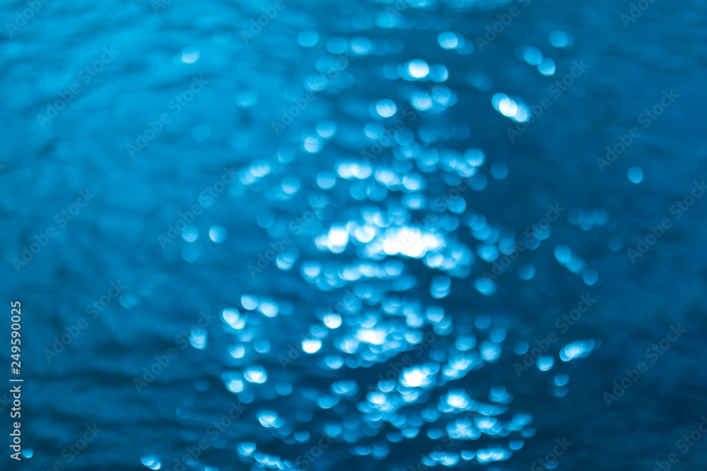 abstract blue background with bokeh lights. Defocused or blurred blue water background. abstract blue background with bokeh lights. Defocused or blurred blue water background.
