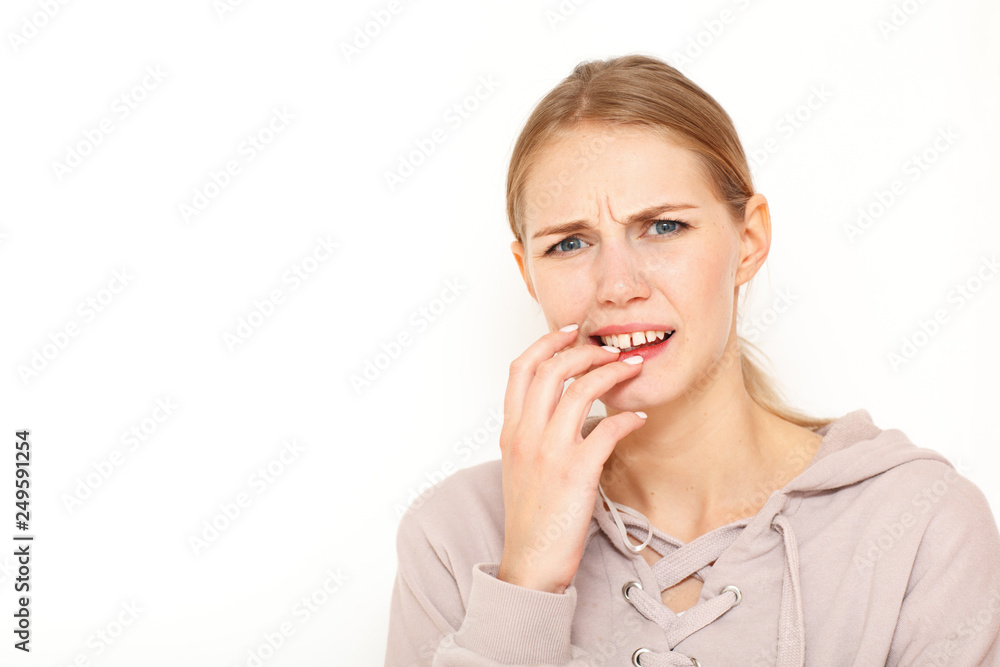 Image of European female with clueless expressions, doubts what to eat delicious for supper, isolated over white background. What to choose? Image of European female with clueless expressions, doubts what to eat delicious for supper, isolated over white background. What to choose?