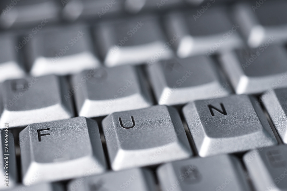 The word fun of the letters on the buttons of the keyboard The word fun of the letters on the buttons of the keyboard