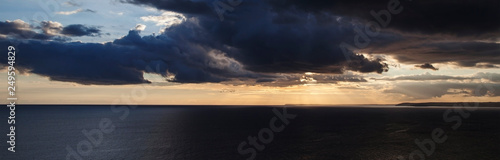 Sunset over the sea with amazing, inspirational skyscape - ocean panorama / header / banner. © EdwardSamuel
