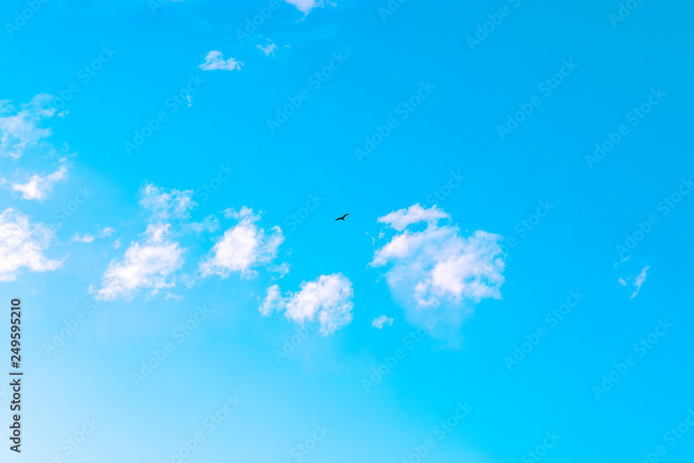 Beautiful Clouds against blue sky. Abstract Background. Blue sky with clouds and sun Beautiful Clouds against blue sky. Abstract Background. Blue sky with clouds and sun