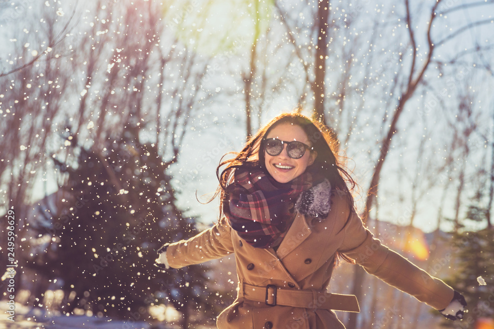 Fototapeta premium Pretty girl in winter park