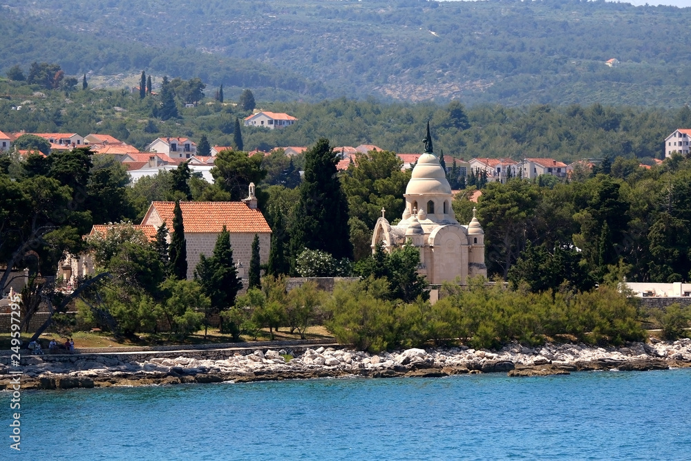 Chapel and mausoleum on a historic cemetery in Supetar, island Brac, Croatia.