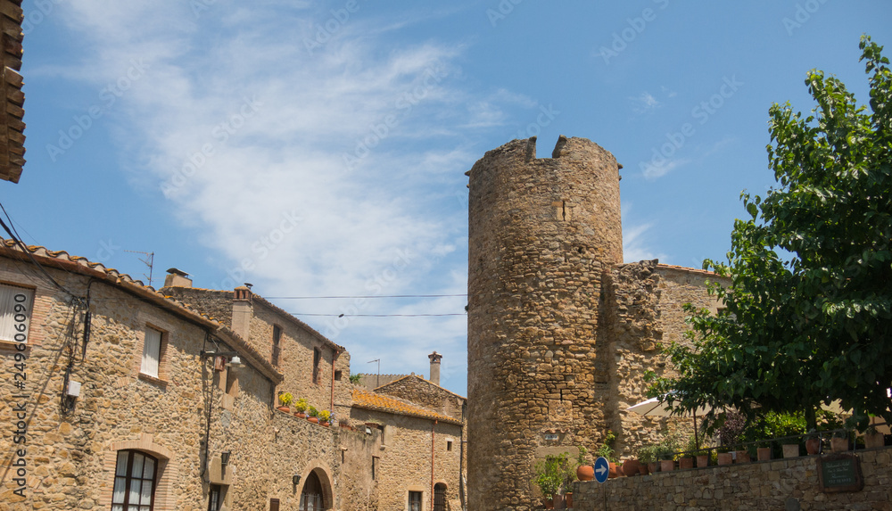 The tower of the medieval castle of Ullastret. Catalonia, Spain