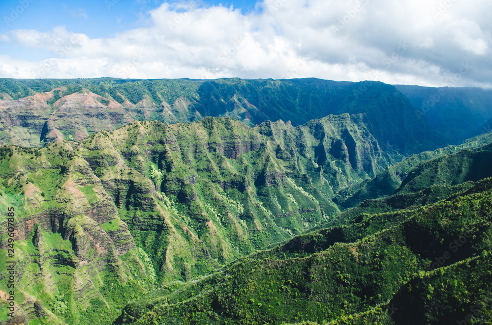 Aerial voew of the typical abrupt mountain ranges in Kauai, US