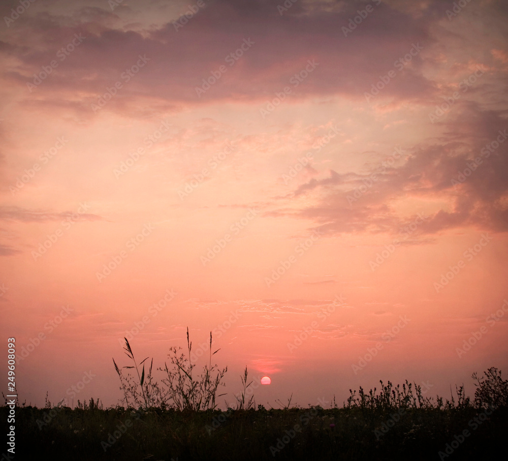 Beautiful, dramatic, colorful clouds and sky at sunset