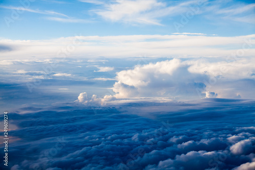 Beautiful  dramatic clouds and sky viewed from the plane. High resolution and quality