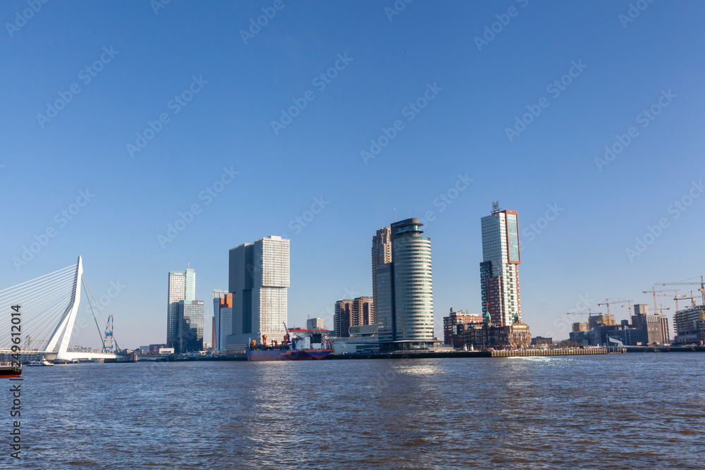 Rotterdam, Netherlands. City skyline on a beautiful sunny day. Rotterdam, Netherlands. City skyline on a beautiful sunny day.