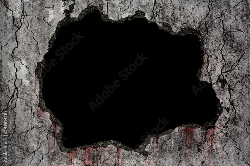 Bloody background scary on damaged grungy crack and broken concrete wall, concept of horror and Halloween