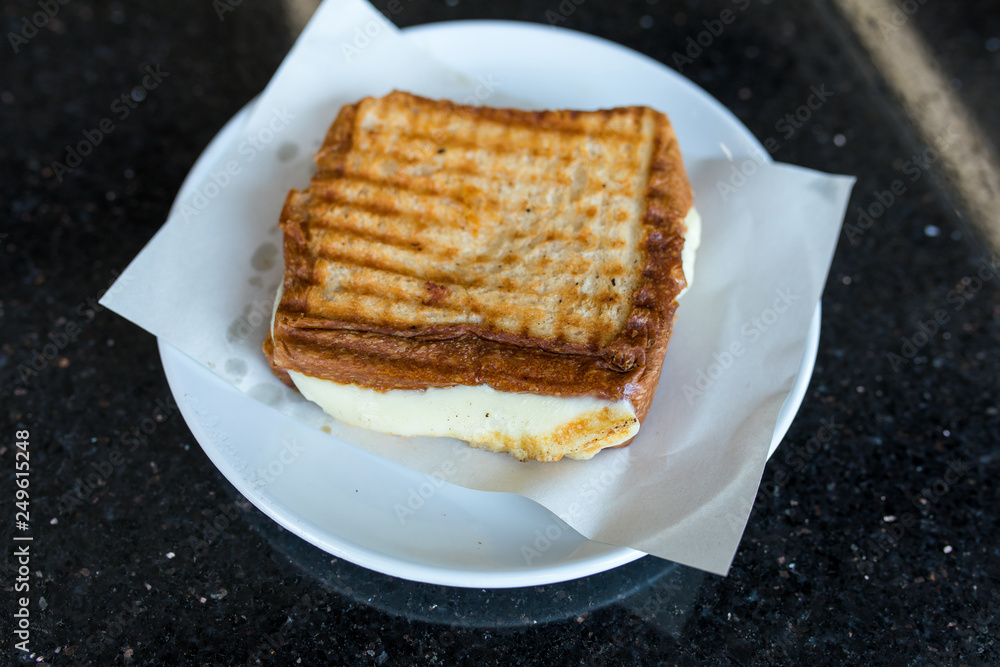 Toast sandwich breakfast with cheese on the plate Toast sandwich breakfast with cheese on the plate