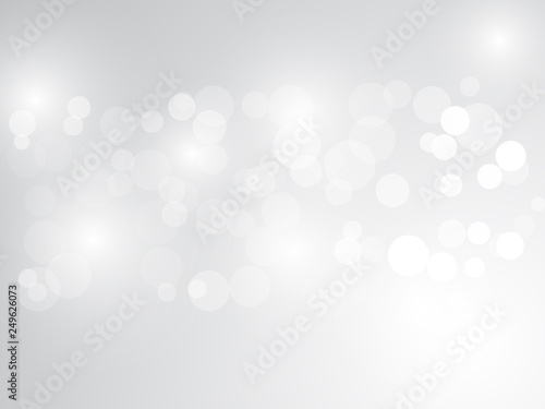 white blur abstract background. bokeh christmas blurred beautiful shiny Christmas lights © milezaway