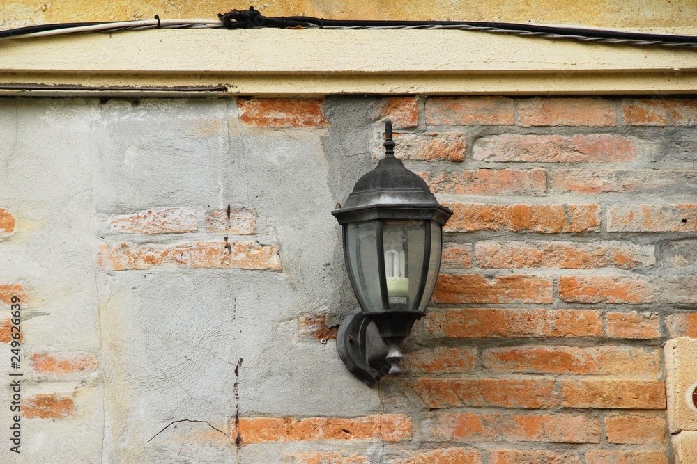 Lamp beside the brick wall vintage style