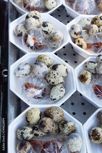 Quail eggs with sauce in street food