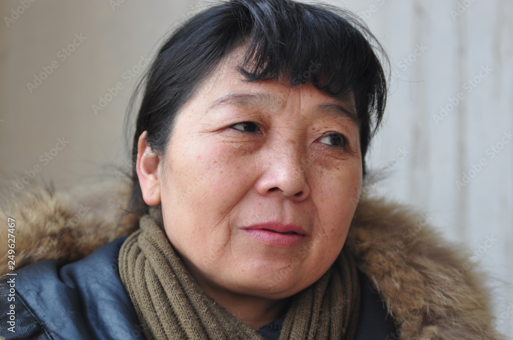 A middle-aged Asian woman A middle-aged Asian woman