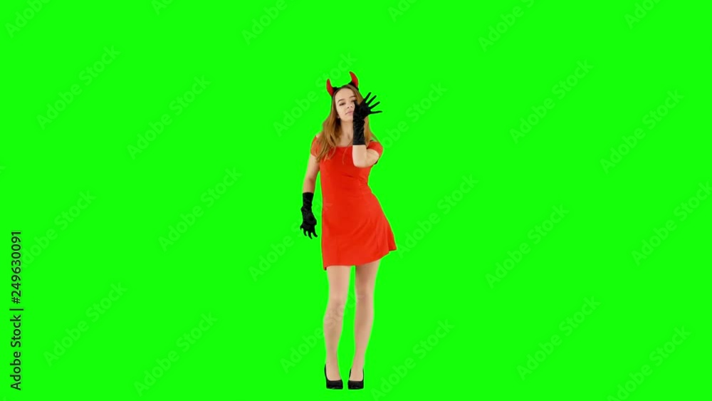 Satan Woman in Red Dress and Horns Dancing Seductive Satan Woman in Red Dress and Horns Dancing Seductive