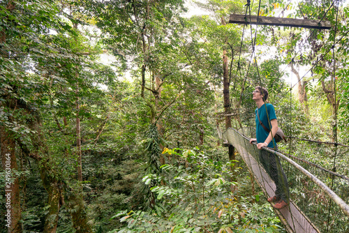 Tall Young Caucasian Man on Canopy Walkway in Mulu National Park, Borneo Malaysia
