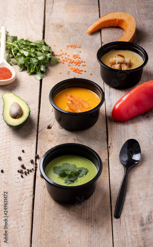 vegetable soup in a bowl and spoon, ready meal to eat