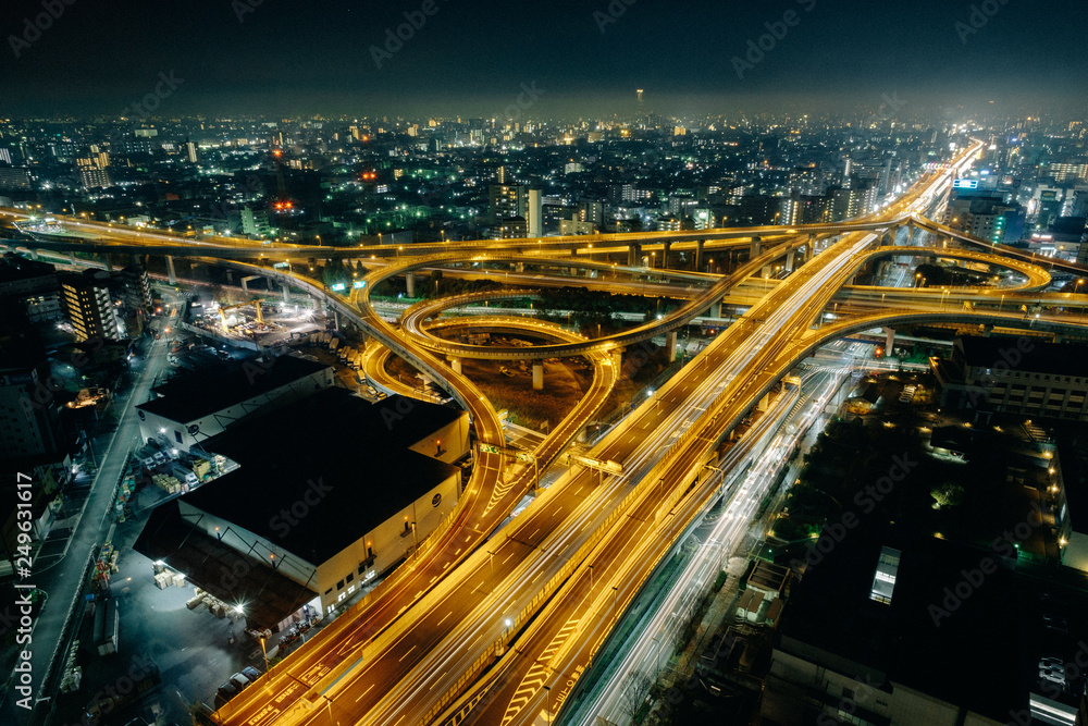 The amazing nightview of highway in Osaka, expressway enter the city, night light picture on top view