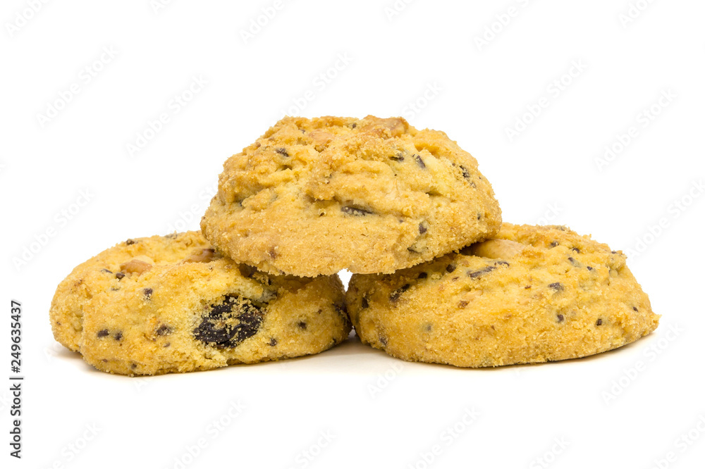 butter cookies with cashew nuts forming pyramid at eye level. isolated on white background butter cookies with cashew nuts forming pyramid at eye level. isolated on white background