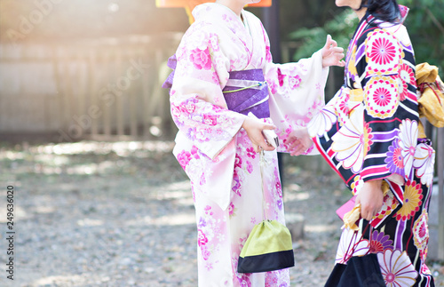 Young women wearing traditional Japanese Kimono at Kyoto, Japan.