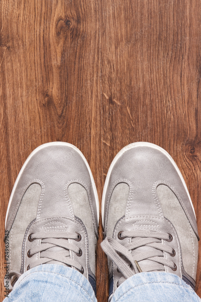 Elegant stylish gray shoes for men on board, place for inscription Elegant stylish gray shoes for men on board, place for inscription