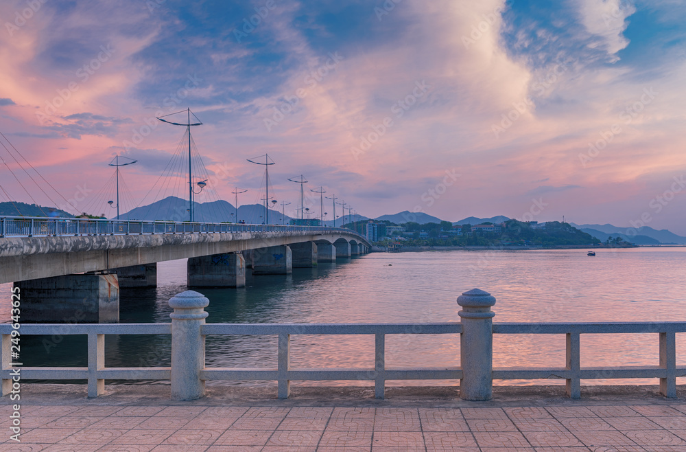 Vietnam; Nha Trang, May 6, 2015. River Kai, embankment and a Bridge at dawn