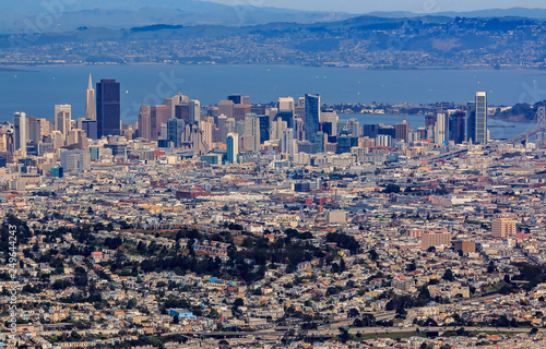 Aerial view of downtown San Francisco and Financial District sky scrapers flying over Glen Park circa 2015 photo