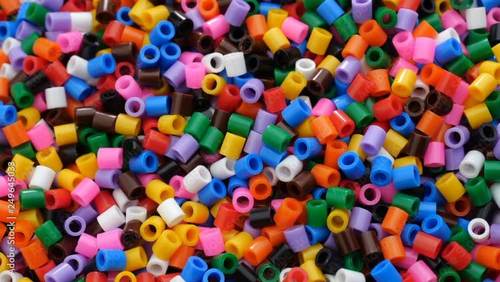 Colorful fusible plastic beads. Close up. Colorful fusible plastic beads. Close up.
