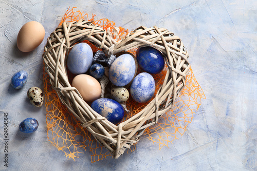 Easter eggs in heart shaped nest