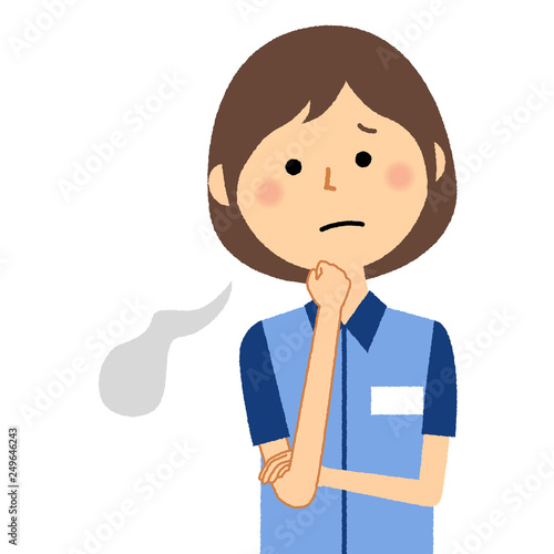 女性店員　ため息