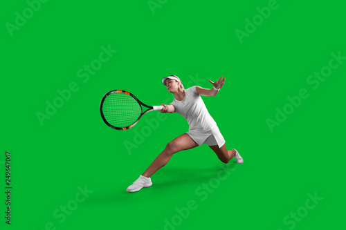 Girl tennis player on green background. © VIAR PRO studio