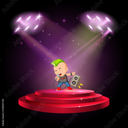 a boy punk singing at the stage