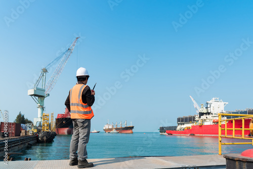 Harbor master supervisor is survey and inspection of the safty berthing along si Fototapeta