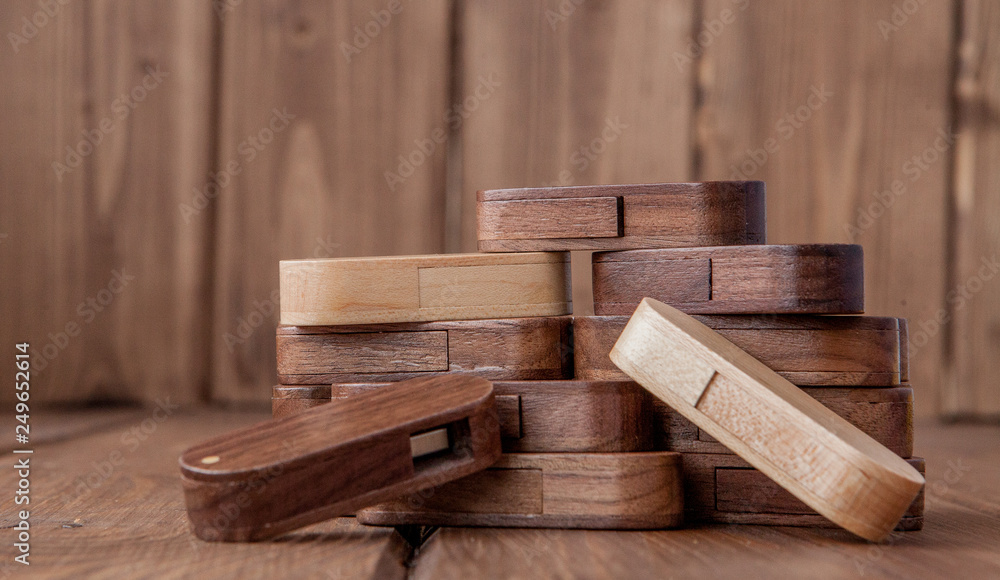 Many wooden usb flash drive on wooden background