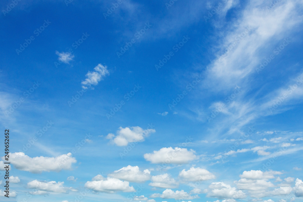 Fluffy cloud above beautiful blue sky background Fluffy cloud above beautiful blue sky background