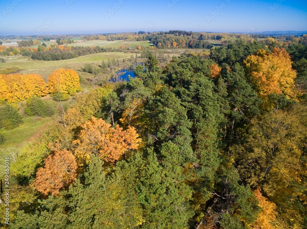 Aerial view of beautiful landscape of Mazury region during autumn season, Konopka Hill (Góra Konopki) in the foreground, Wegorzewo, Poland
