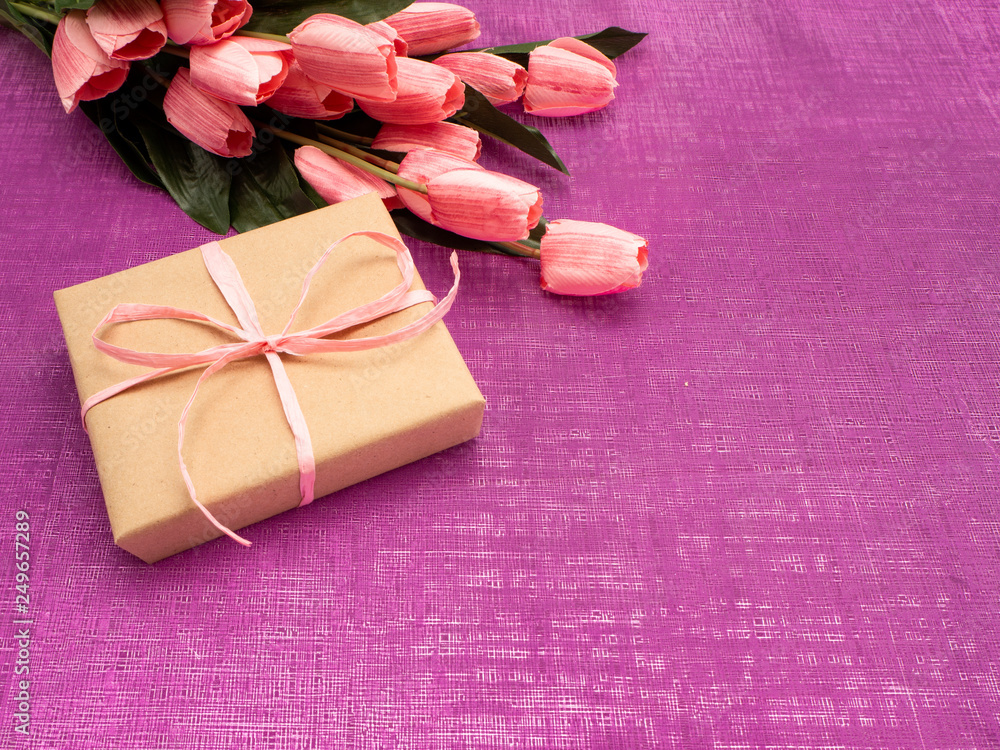 Purple tulip and gift box on Purple background